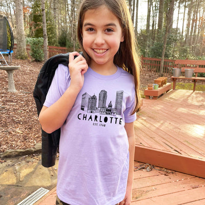 Charlotte, NC Skyline - Kid's Tee - Lavender Large Apparel & Accessories - Baby & Kids Moonlight Makers Paper Skyscraper Gift Shop Charlotte