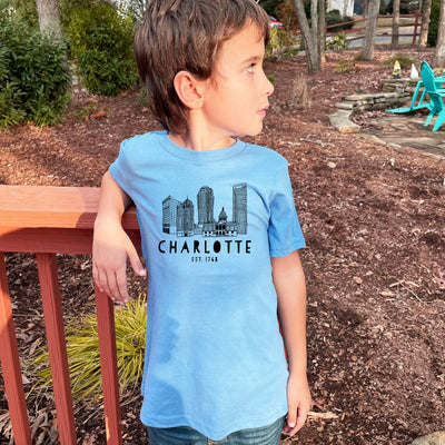 Charlotte, NC Skyline - Kid's Tee - Lavender Large Apparel & Accessories - Baby & Kids Moonlight Makers Paper Skyscraper Gift Shop Charlotte