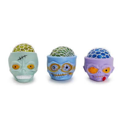 Skull Squeezie | Glitter Gel Skull Unit - Rubber | Assorted Holiday Two's Company  Paper Skyscraper Gift Shop Charlotte