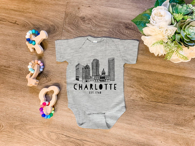 Charlotte Skyline Gray Onesie | 6 Months Baby Moonlight Makers  Paper Skyscraper Gift Shop Charlotte